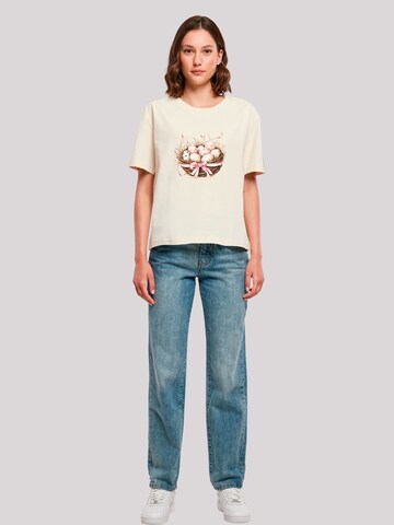 T-shirt 'Osterei Nest Korb Dekor' F4NT4STIC en beige