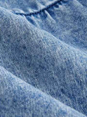 Next Overall in Blauw