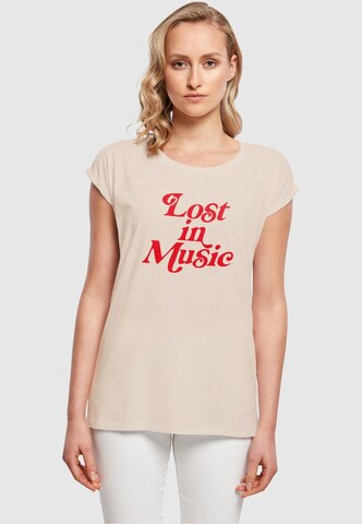 T-shirt 'Lost In Music' Mister Tee en beige : devant