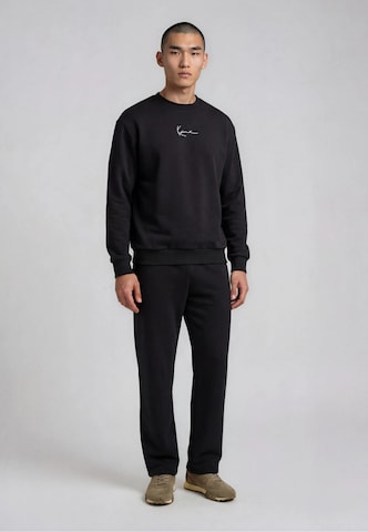 Sweat-shirt Karl Kani en noir