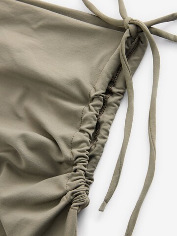 Next - Top en verde