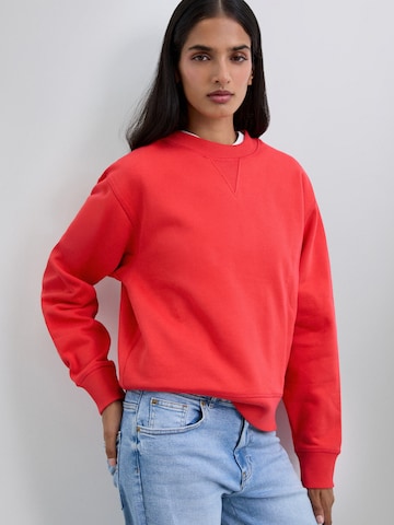 Sweat-shirt ' ' Scalpers en rouge