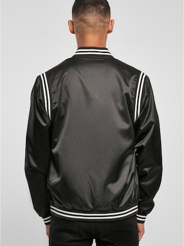 Urban Classics Prehodna jakna 'Satin' | črna barva
