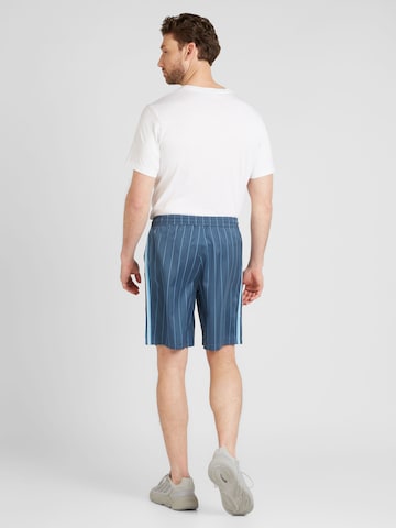 ADIDAS ORIGINALS Regular Bukse 'Sprinter' i blå