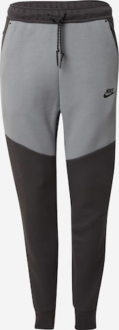 Effilé Pantalon 'TCH FLC' Nike Sportswear en gris : devant