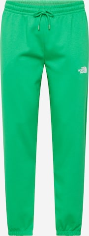 Tapered Pantaloni 'ESSENTIAL' de la THE NORTH FACE pe verde: față