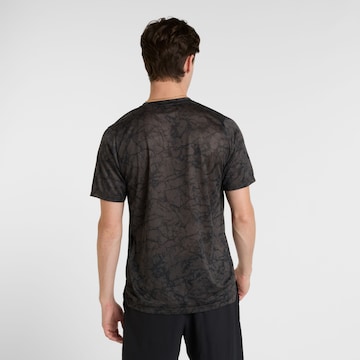 new balance Functioneel shirt 'Athletics' in Zwart