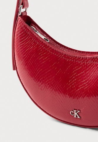 Calvin Klein Τσάντα ώμου 'FESTIVE' σε κόκκινο: μπροστά