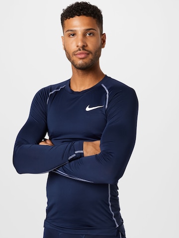 Coupe regular T-Shirt fonctionnel NIKE en bleu : devant