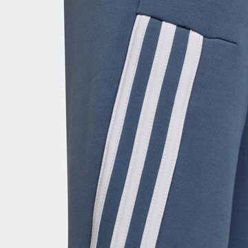 ADIDAS SPORTSWEAR - Tapered Calças de desporto 'Future Icons' em azul