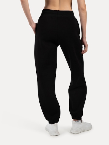 Effilé Pantalon Smilodox en noir