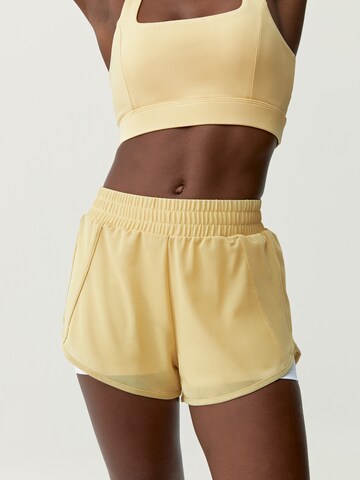 Born Living Yoga Slim fit Sports trousers 'Padma 2.0' in Yellow: front