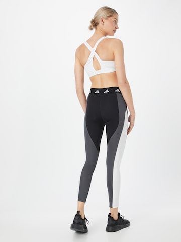 ADIDAS PERFORMANCE Skinny Športové nohavice - Sivá