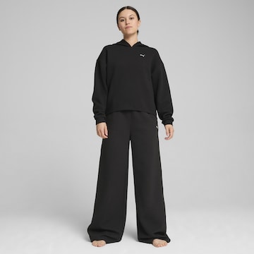 PUMA Sweatshirt 'Q4 Studio' in Black: front