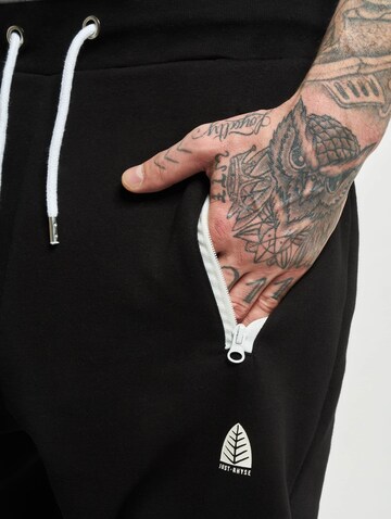 Effilé Pantalon 'Just Rhyse' Urban Classics en noir