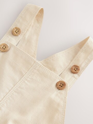 regular Pantaloni con pettorina di Next in beige