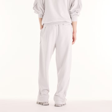 new balance - Perna larga Calças 'Trackside French Terry Pant' em branco