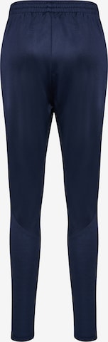 Hummel Zwężany krój Spodnie sportowe 'Staltic' w kolorze niebieski