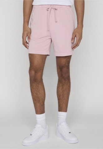 Urban Classics Loose fit Trousers in Pink: front