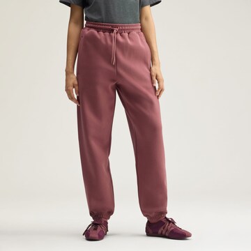 Tapered Pantaloni sportivi di ADIDAS BY STELLA MCCARTNEY in rosso: frontale