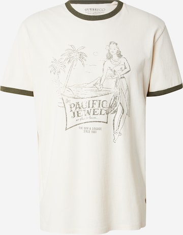 smėlio GUESS Marškinėliai 'NO PLAN TO LEAVE': priekis