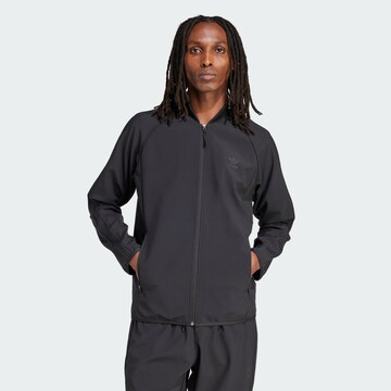 Veste de survêtement 'SST' ADIDAS ORIGINALS en noir : devant