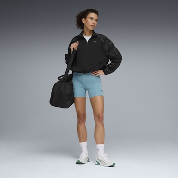 PUMA Skinny Sportbroek 'TAD Essentials' in Blauw