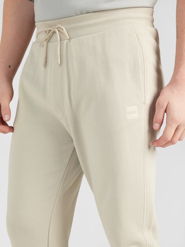 Tapered Pantaloni 'Sestart' di BOSS in beige