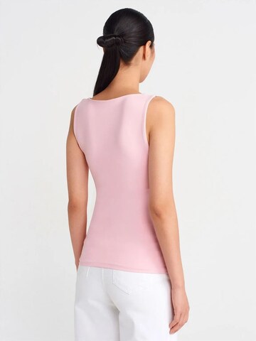 Top di Dilvin in rosa