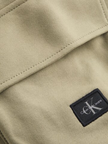 Calvin Klein Jeans Ohlapna forma Kargo hlače | bež barva
