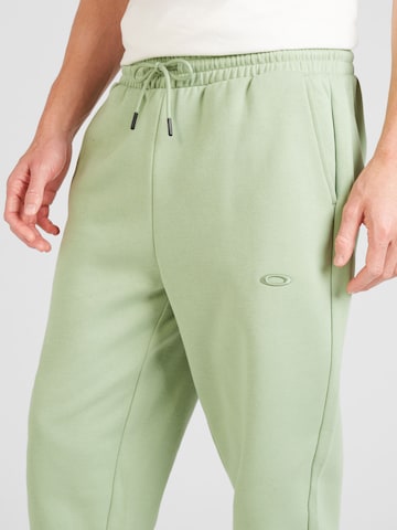 OAKLEY Конический (Tapered) Спортивные штаны 'RELAX 2.0' в Зеленый
