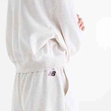 Loosefit Pantaloni 'Trackside' di new balance in beige