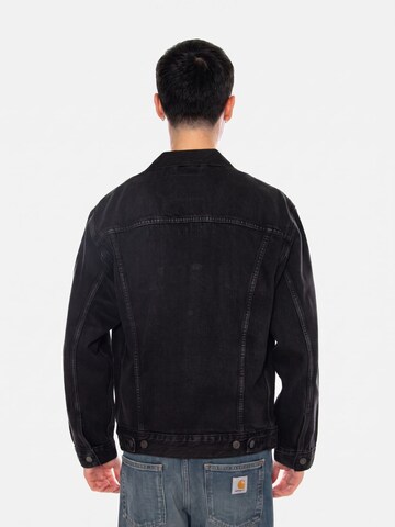 LEVI'S ® Between-season jacket 'RELAXED TYPE III TRUCKER JACKET BLACK' in Black