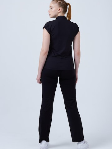 SPORTKIND - Camiseta funcional 'Polo Shirt Loose-Fit' en negro