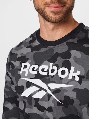 Reebok Sportsweatshirt in Zwart