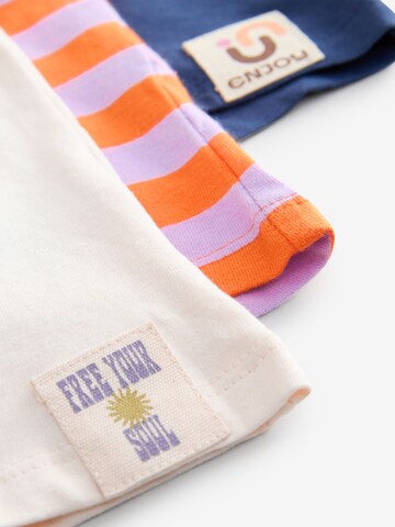 T-Shirt Next en bleu