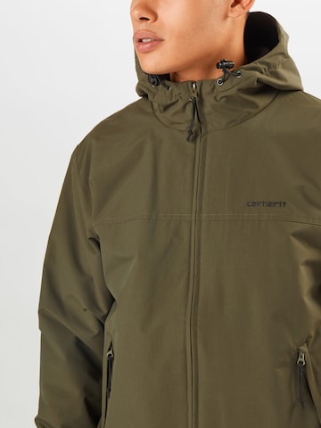 Carhartt WIP Regular fit Prehodna jakna 'Sail' | zelena barva