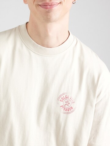 T-Shirt 'Nuevo' Pegador en beige