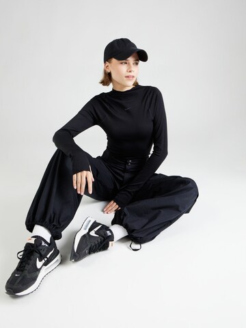 Maglia funzionale di NIKE in nero