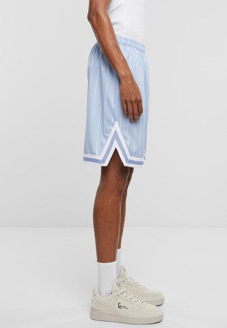 Karl Kani Loose fit Pants in Blue