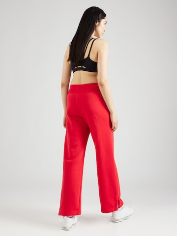 Wide leg Pantaloni 'Phoenix Fleece' di NIKE in rosso