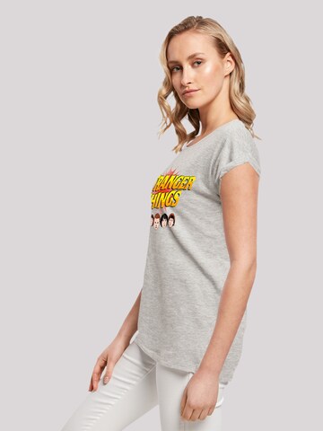 T-shirt 'Stranger Things Comic Heads Netflix TV Series' F4NT4STIC en gris