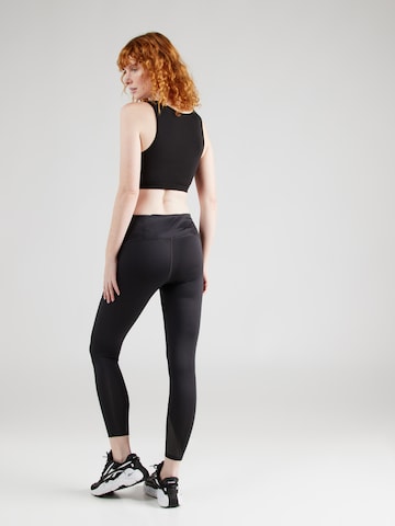 Skinny Pantaloni sportivi 'VECTOR' di Reebok in nero