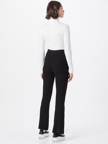 Urban Classics Flared Pants in Black