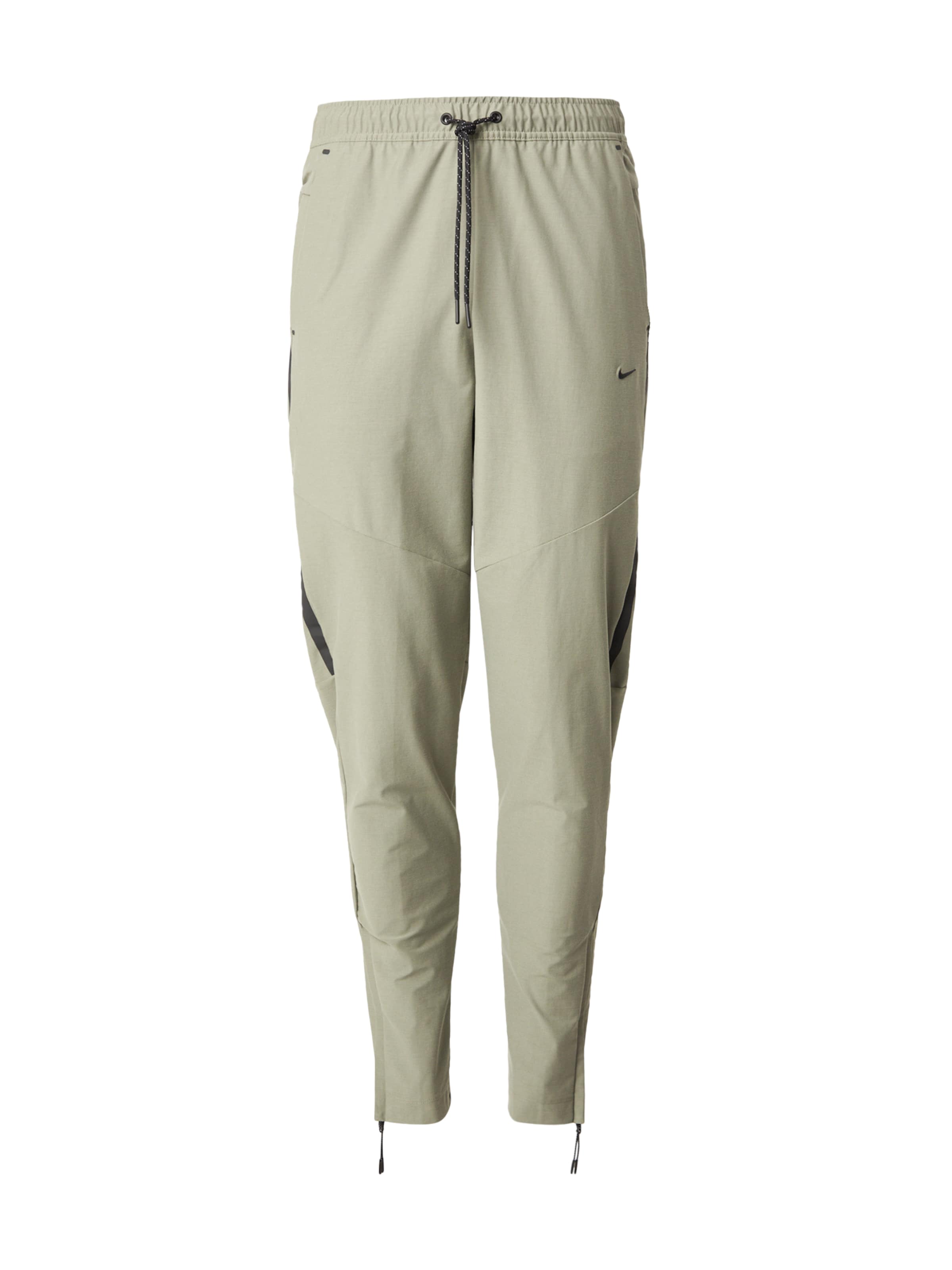 Nike Sportswear Slim fit Trousers in Green: front