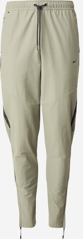 Nike Sportswear Slim fit Trousers in Green: front