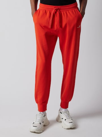 OWN Off With Nature Regular Broek 'Joggers' in Oranje: voorkant