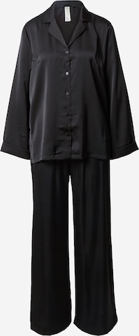 Lindex Pyjama värissä musta: edessä
