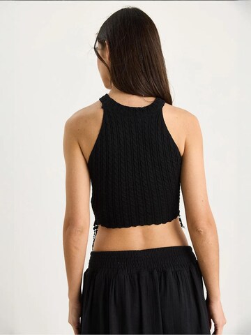 Top in maglia di Bianco Lucci in nero