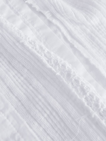 Top de la Next pe alb